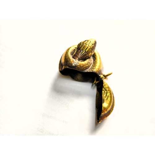 122 - A brass cased snake vesta, 4cm x 3.5cm. 17.6gms