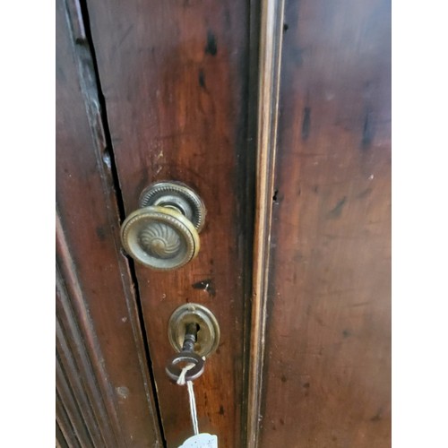 5 - An antique mahogany corner cabinet with two shelves and a door with key. Brass knob.114cm x 90cm x 5... 