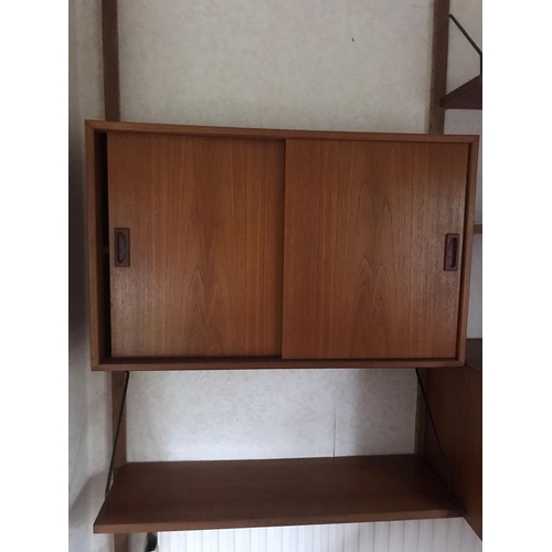 16 - A mid century Ladderax-style wall unit. Approx dimensions when assembled. 200cm x 160cm x 23-39cm.