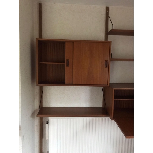 16 - A mid century Ladderax-style wall unit. Approx dimensions when assembled. 200cm x 160cm x 23-39cm.