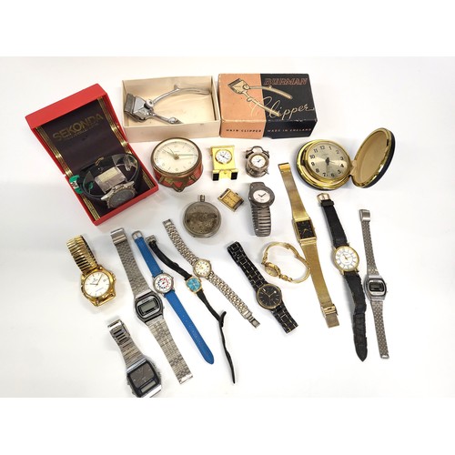 408 - A collection of fourteen watches, two travel alarm clocks, two miniature clocks, a boxed hair clippe... 