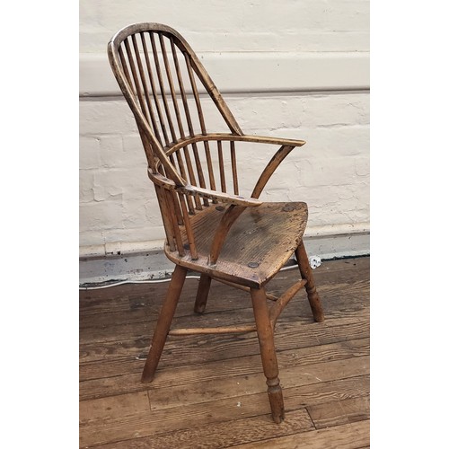 3 - A continuous arm Windsor chair with looped back, continuous flowing armrest and shaped seat over tur... 