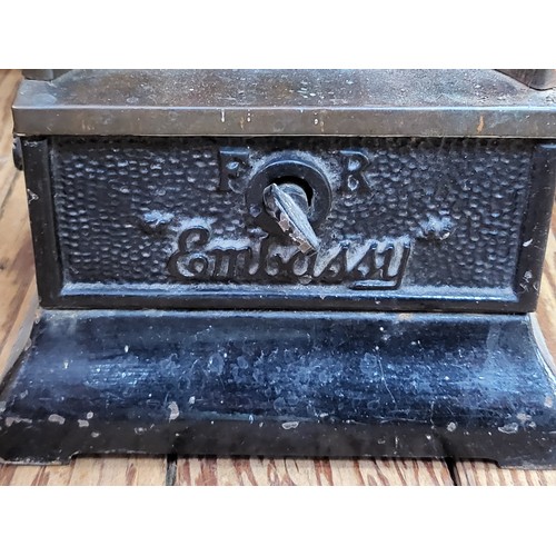 23 - A black painted oil heater made by Embassy .92cm x 19cm x 19cm.