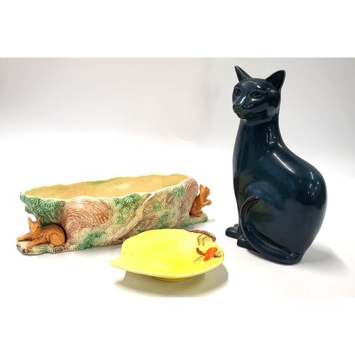 189 - A Sylva 2598 Squirrel trough 35cm wide, Royal Venton Ware yellow leaf dish 18cm, and a Poole cat 29c... 