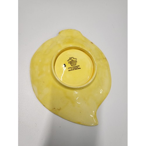 189 - A Sylva 2598 Squirrel trough 35cm wide, Royal Venton Ware yellow leaf dish 18cm, and a Poole cat 29c... 