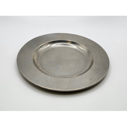 173 - A Thomas Williams pewter shallow dish 12.5cm diameter 166gms.