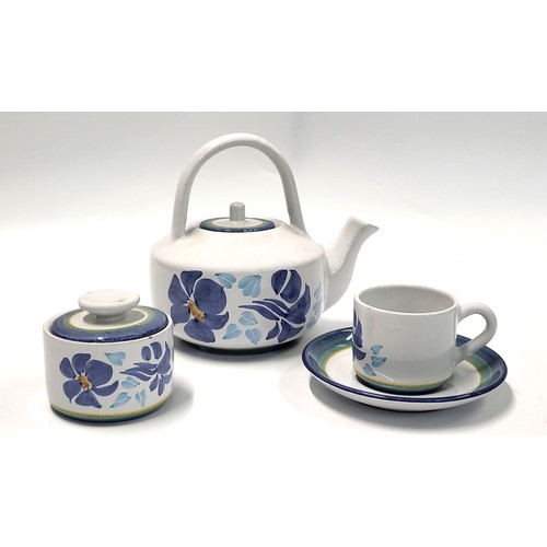 197 - A Peruvian dinner and tea service with blue and turquoise floral pattern. (62)