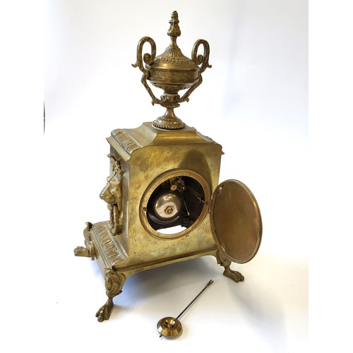 53 - An Antique brass striking mantle clock by Comptoir General, Paris. H.Riodet with key. c1880. 42cm.