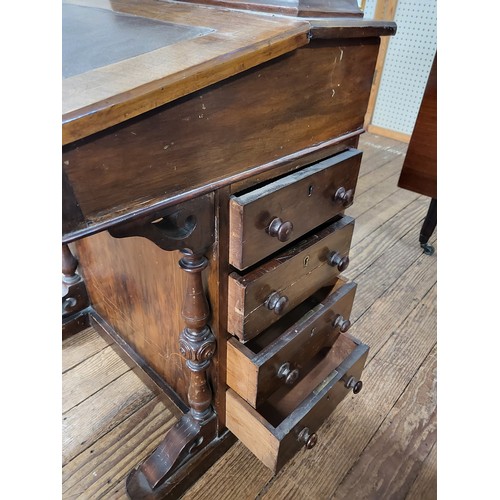 37 - A mahogany Davenport desk with a pencil/ pen section under a marquetry feature,  leather insert on t... 