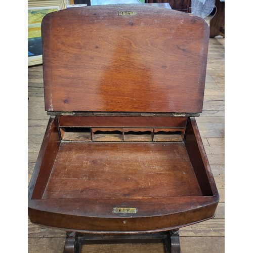 37 - A mahogany Davenport desk with a pencil/ pen section under a marquetry feature,  leather insert on t... 