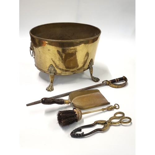 174 - Brass coal scuttle and fire irons.