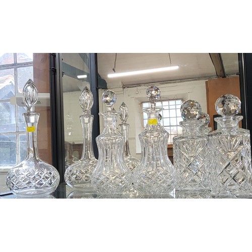 216 - Three pairs of cut glass decanters with stoppers 23cm to 31cm (6)