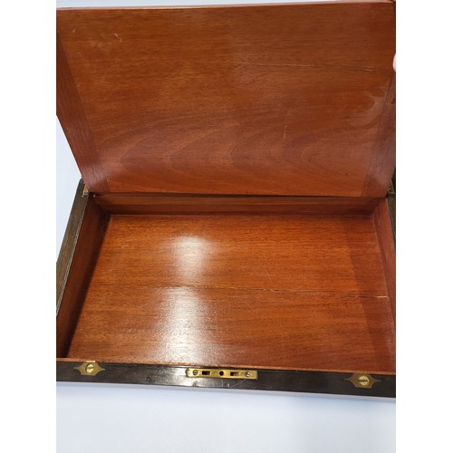 40 - A mahogany writing slope monogrammed and dated 1835 with black insert, ink pot and key 14cm x 41cm x... 