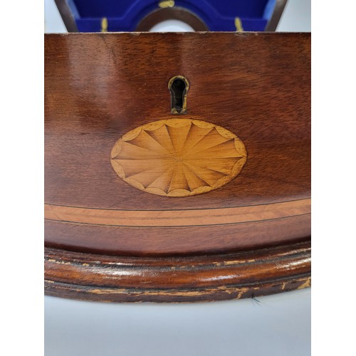 41 - An empty Edwardian horseshoe shaped canteen box with inlay and blue velvet interior, dated 1927 (pre... 