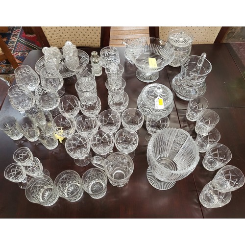 219 - Cut glass table wares including sets and part sets of drinking glasses, cruet set, jugs, bowls, salt... 