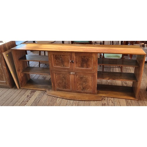 49 - A walnut 1930/40's display/drinks cabinet. In two pieces. 162cm x 204cm x 45cm.