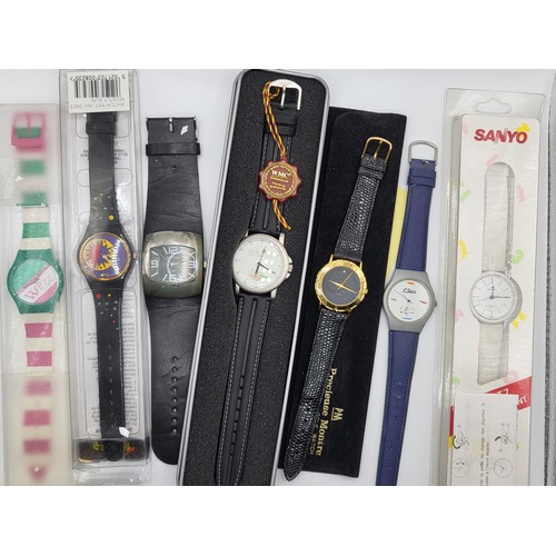 391 - A collection of seven various fashion watches including Clio car watch. (7)