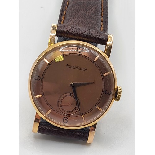 401 - An 18ct Jaeger-Le Coultre (cal 428) watch. c1940's.