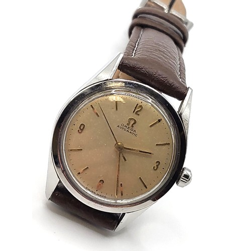 402 - An Omega automatic (cal 471) c1954 watch on an Ostrich strap.