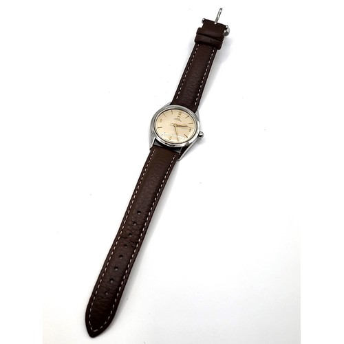 402 - An Omega automatic (cal 471) c1954 watch on an Ostrich strap.