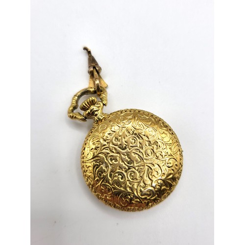 405 - A gilt metal pocket watch, gilt dial with Roman numerals, the case with embossed decoration, associa... 