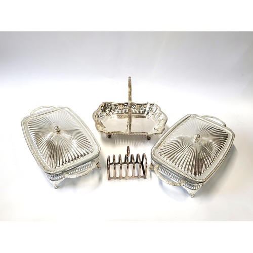 165 - A collection of silver plate including EPNS tea set, toast rack, three dishes, tureen and lid, and t... 