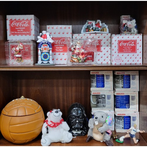 144 - Five Coca-Cola Christmas ornaments in boxes, two Coca-Cola soft toys, six Corinthian football subjec... 