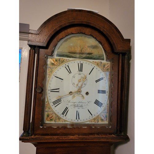 20 - An oak long case clock by Beringer Schwrer & Co Redruth. 60cm x 25cm x 200cm