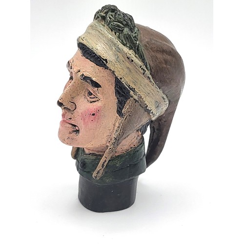 77 - A cold painted bronze walking cane handle in the form of a medieval serf's head. 146gms 8cm