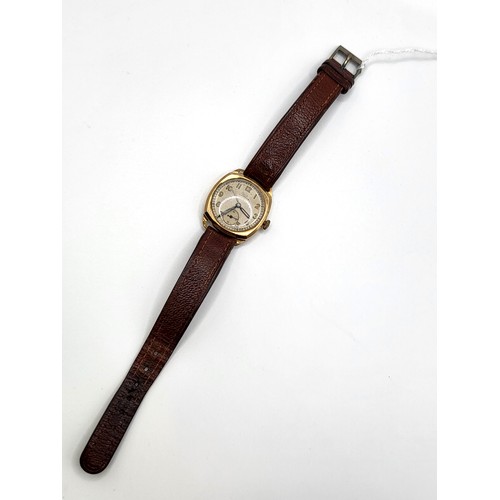 285 - A vintage Limit Sports 1940's 9ct gold wristwatch. 29.5mm case on a brown leather strap.