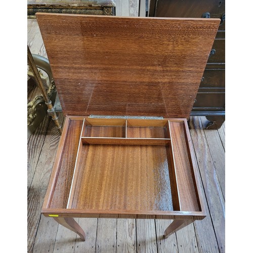 10 - A musical box table with an inlaid style top.50cm x 45cm x 55cm.