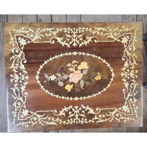 10 - A musical box table with an inlaid style top.50cm x 45cm x 55cm.