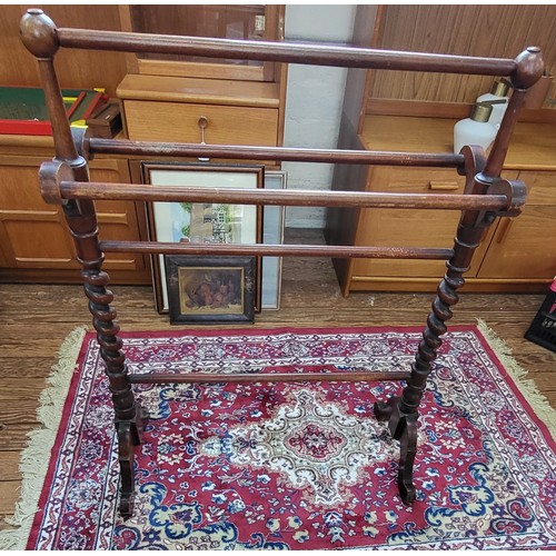 28 - A bedroom ladder back chair with gold upholstery, and ball and claw feet, an oak clothes drier with ... 