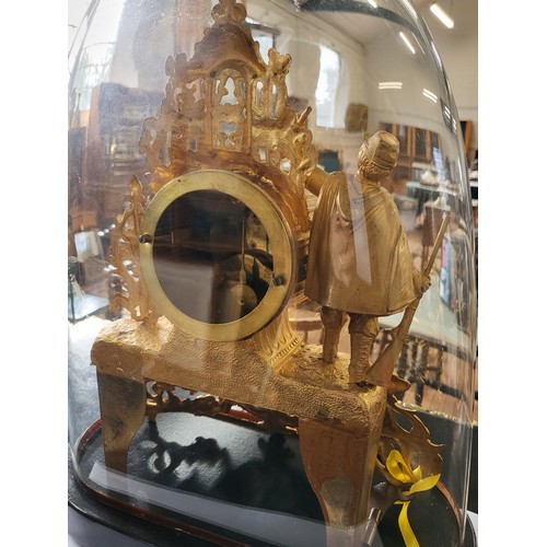 59 - Antique French style 'Camus' brass sculpture clock on a wooden plinth under a glass dome.
Clock runn... 