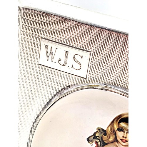 266 - An antique silver engine turned cigarette case with nude enamel panel to lid. Monogramed WJS at top ... 