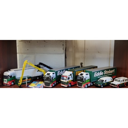 142 - Corgi Classics Eddie Stobart vehicles including Ford Escort van, Defender two cranes and Volvo artic... 