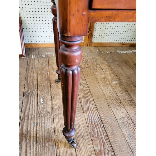 28 - A mahogany wash stand with marble top and back, over two small drawers with wooden knobs, supported ... 