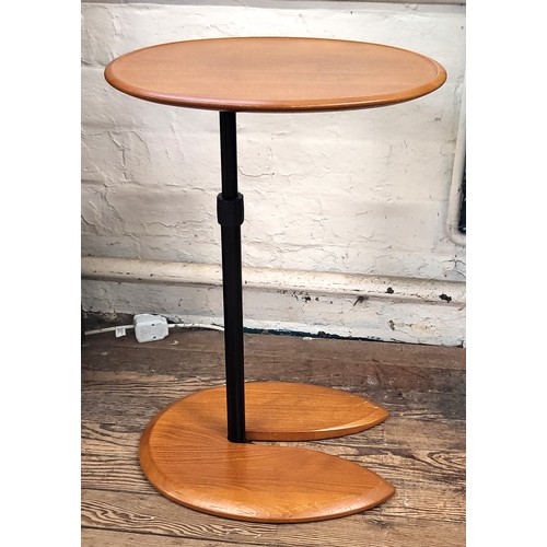 33 - A Norwegian 'Eclipse Stressless' side table extends in height