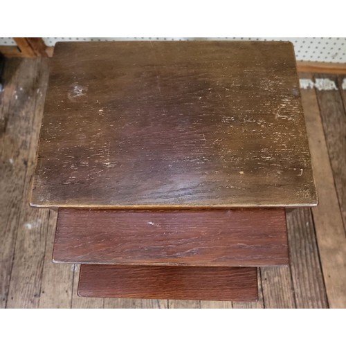 42 - A mahogany nest of three tables 49cm x 51cm x 35cm.