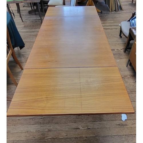 54 - A dining table 74cm x 120cm x 80cm (extends by two leaves at the end 45cm each) and four Arne Hovman... 