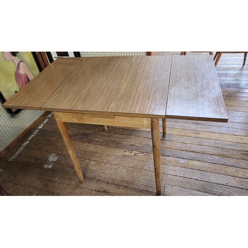 56 - A mid century kitchen table (extendable) square table with formica top 79cmx 68cm x 66cm. (extends t... 