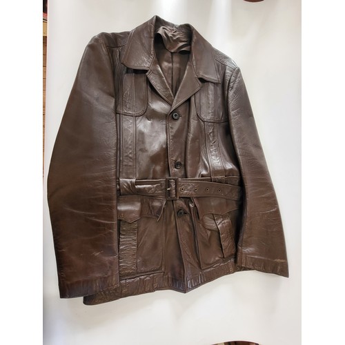 133 - A Typically stylish 1970's dark brown genuine English leather 3/4 length jacket with matching belt.