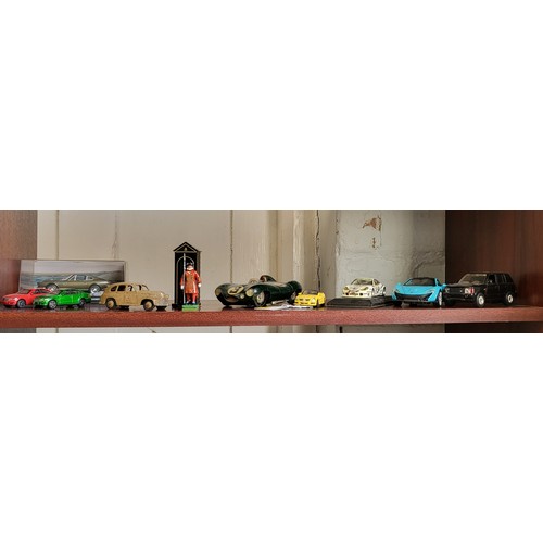 155 - Dinky Toy fawn Standard Vanguard, Merit dark green Jaguar racing number 3, other diecast cars includ... 