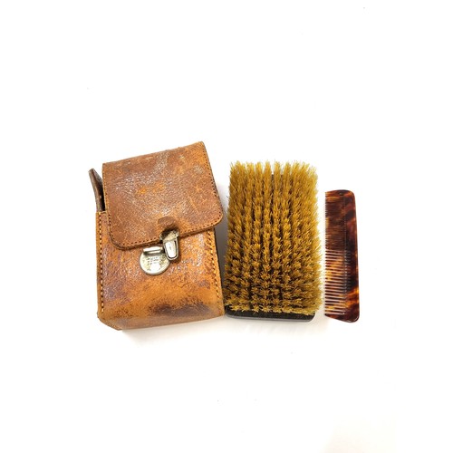 166 - A leather cased gentleman's grooming set, a Kodak Retinette 1B vintage camera, and a vintage leather... 