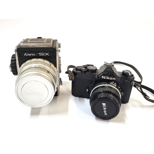 173 - A Kowa six w/85mm f2.8lens medium format film camera from Japan, and a Nikon SLR camera.