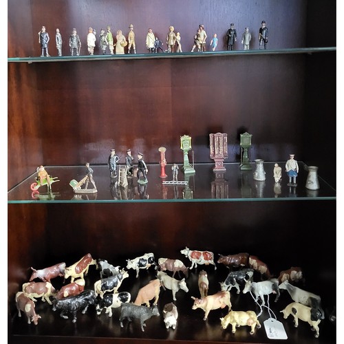 174 - 0 gauge figures and animals including station staff, passengers, weighing machine, chocolate and cig... 