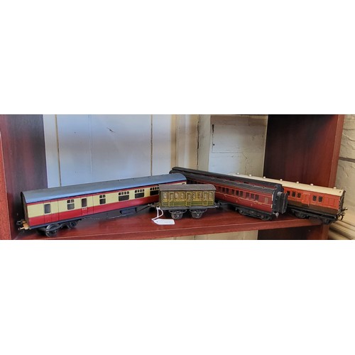 177 - Hornby 0 gauge Southern coach 1728 3rd class; three bogie coaches. (4)