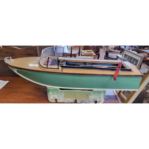 182 - A scratch built motorised speed boat. 93cm long.