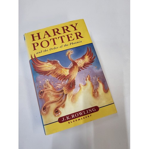 186 - A collection of vintage books including Harry Potter and the Order of the Phoenix first edition (fad... 