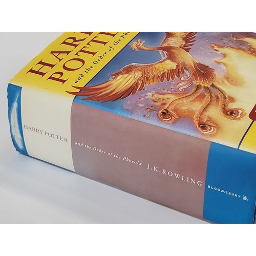 186 - A collection of vintage books including Harry Potter and the Order of the Phoenix first edition (fad... 